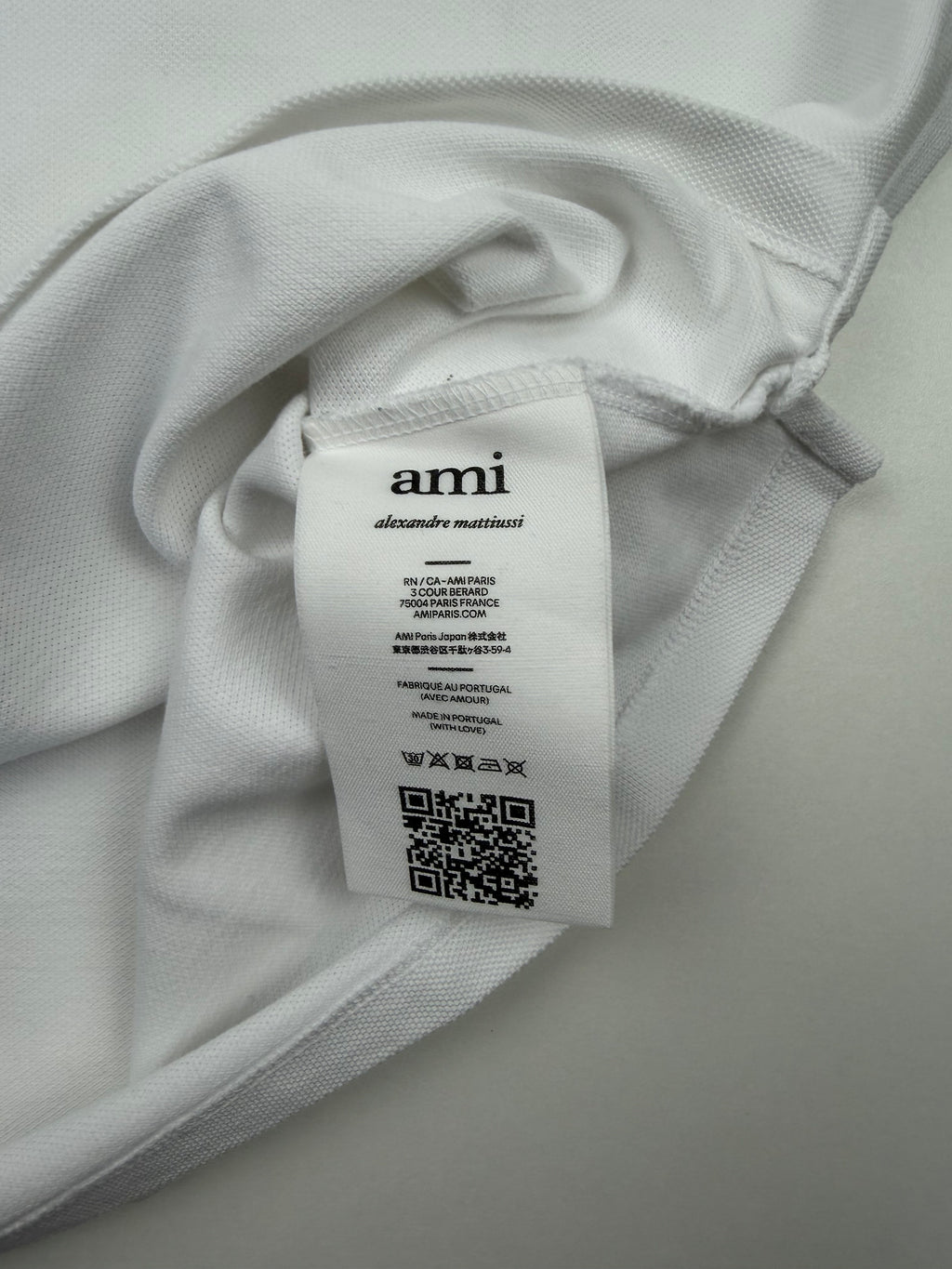 Polo AMI – Taille L – Blanc avec Logo Cœur Rouge