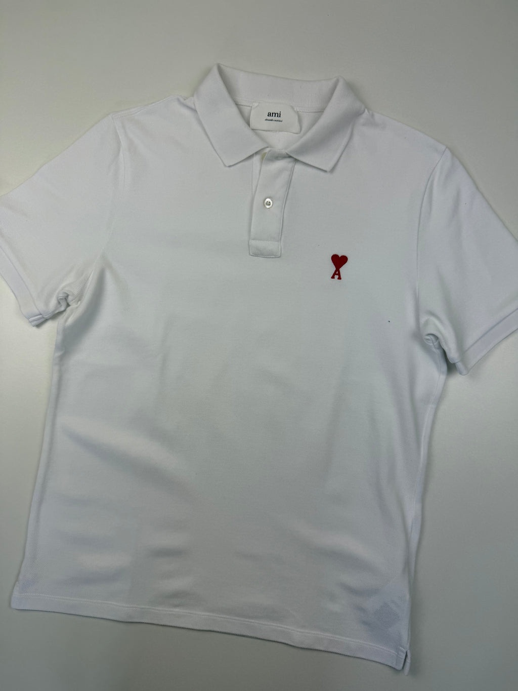 Polo AMI – Taille L – Blanc avec Logo Cœur Rouge